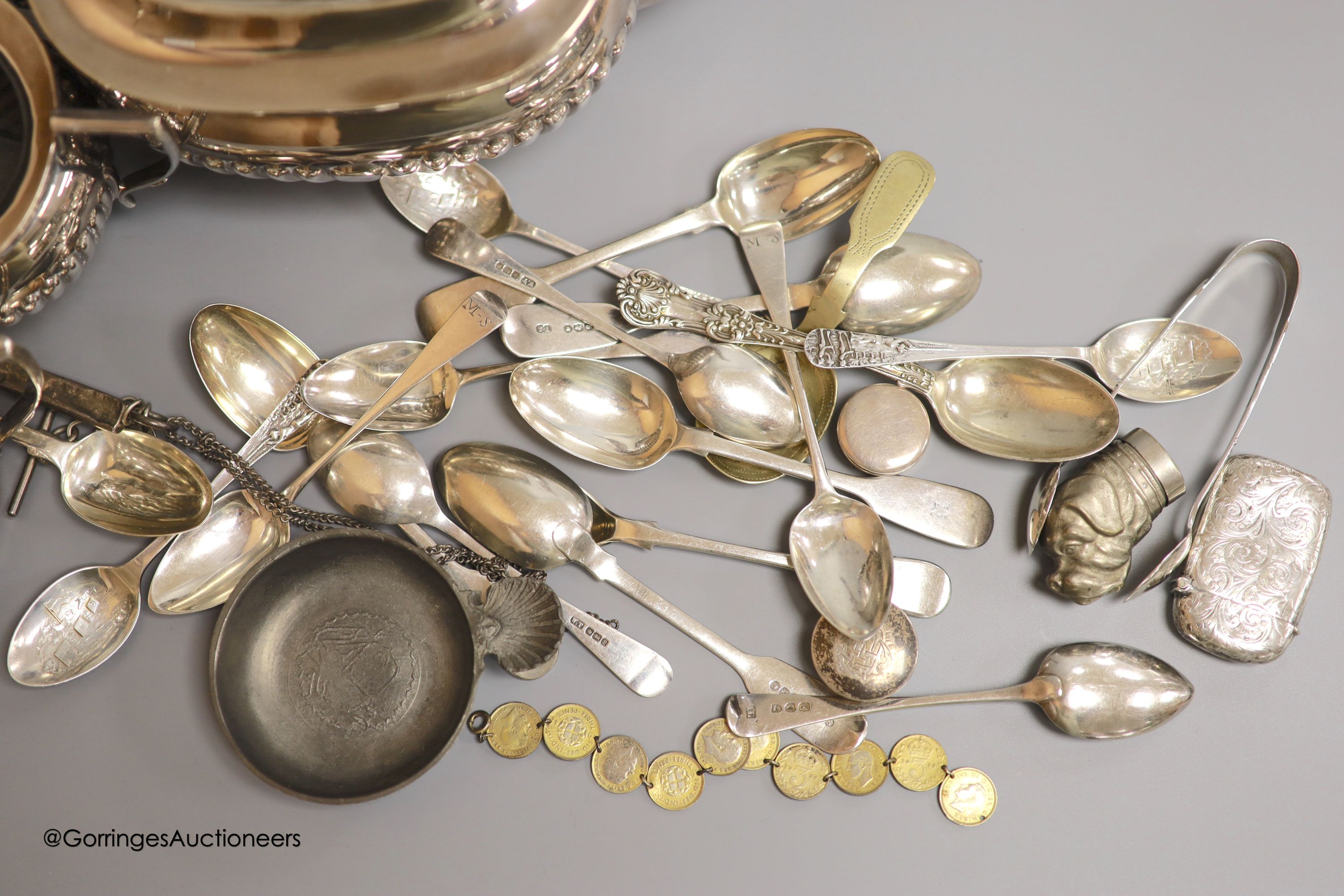 Assorted silver and plated wares including a silver mounted glass scent bottle, London, 1899, a similar cased christening trio, silver pill boxes, teaspoons and vesta case, plated tea set and minor items.